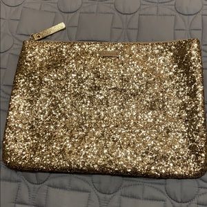 Kate Spade gold glitter clutch